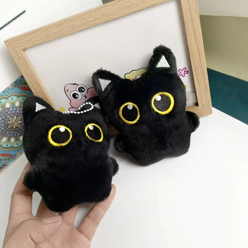 Cute plush toy of a black cat, - đánh giá và giá Photography Rules