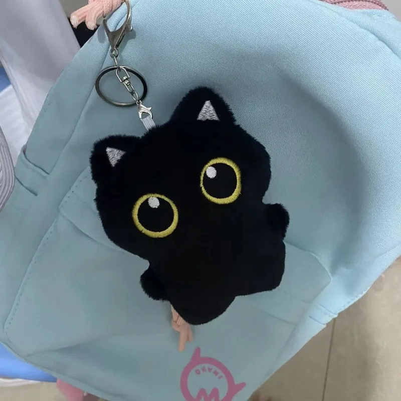Cute plush toy of a black cat, - đánh giá và giá Photography Rules