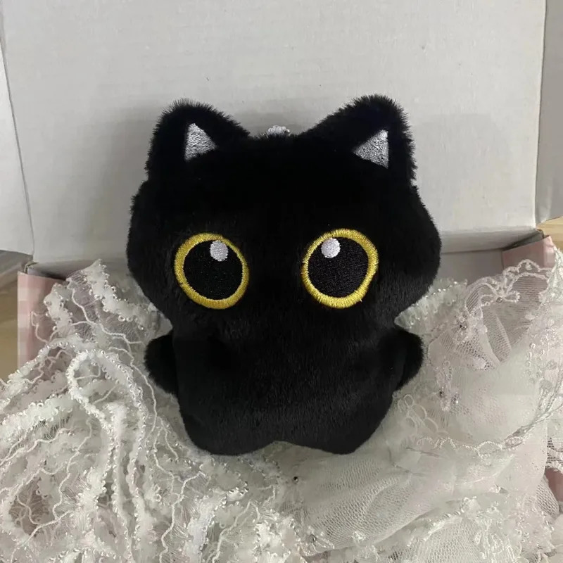 Cute plush toy of a black cat, - đánh giá và giá Photography Rules